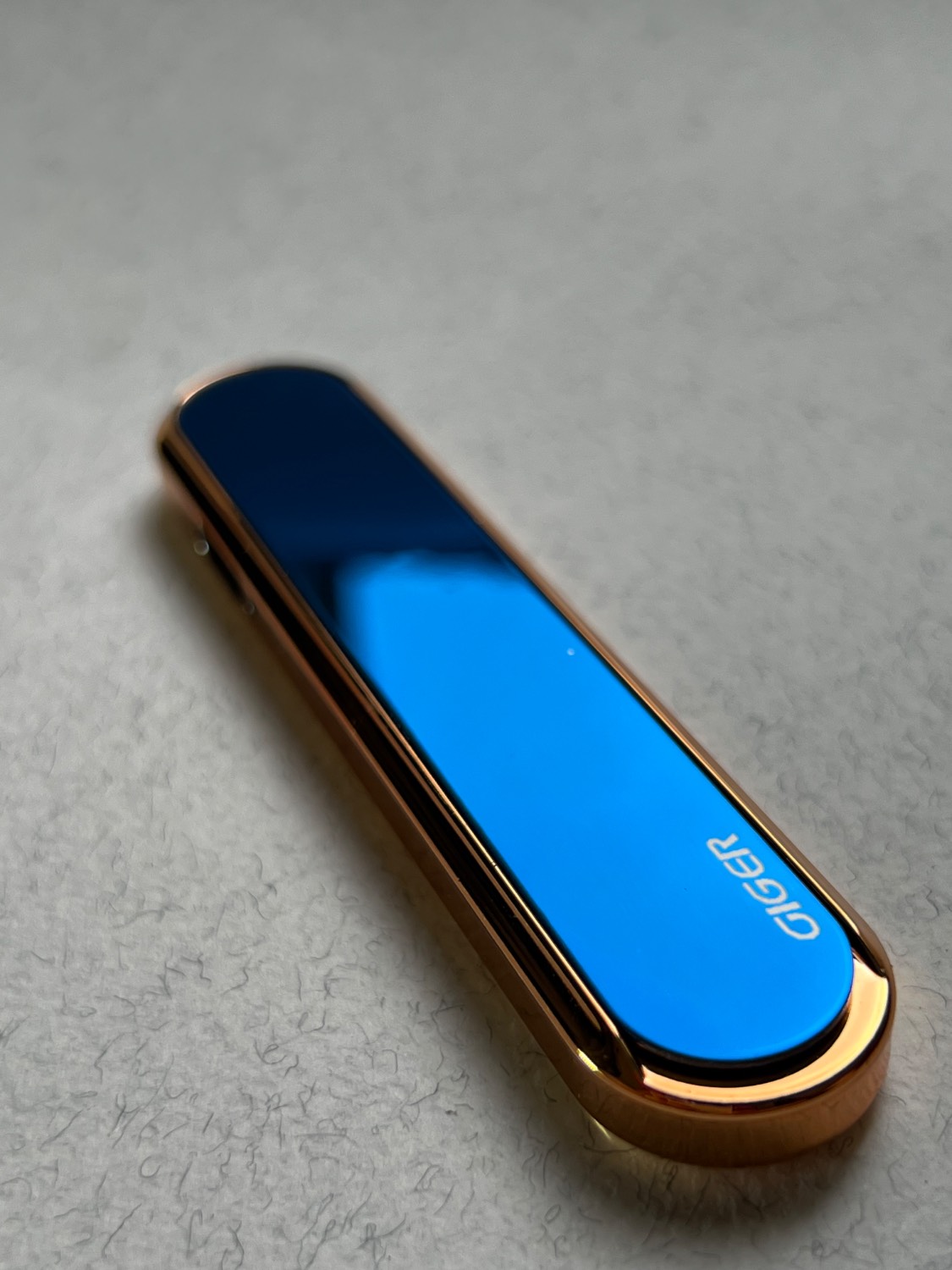 فندک المنتی برند گیگر (GIGER) مدل کشویی شارژی USB بدون نیاز به گاز