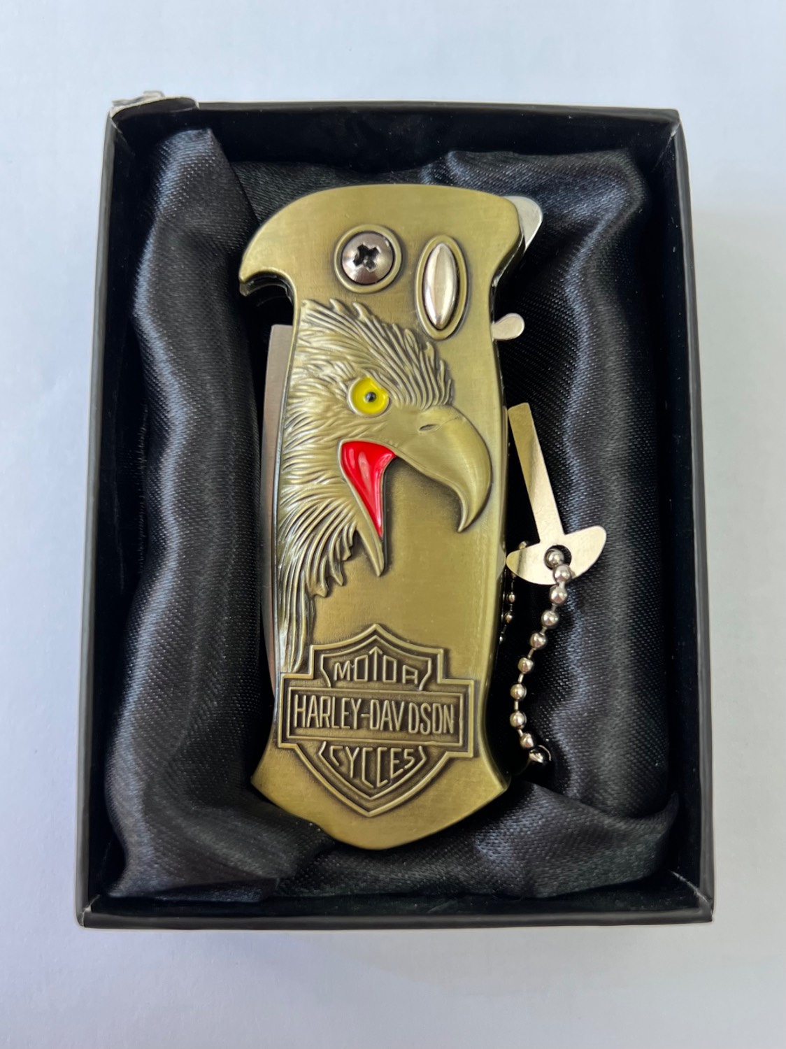 فندک اتمی برند لایتر(Lighter) دوکاره طرح هارلی دیویدسون همراه با چاقوی ضامندار مخفی رنگ طلایی