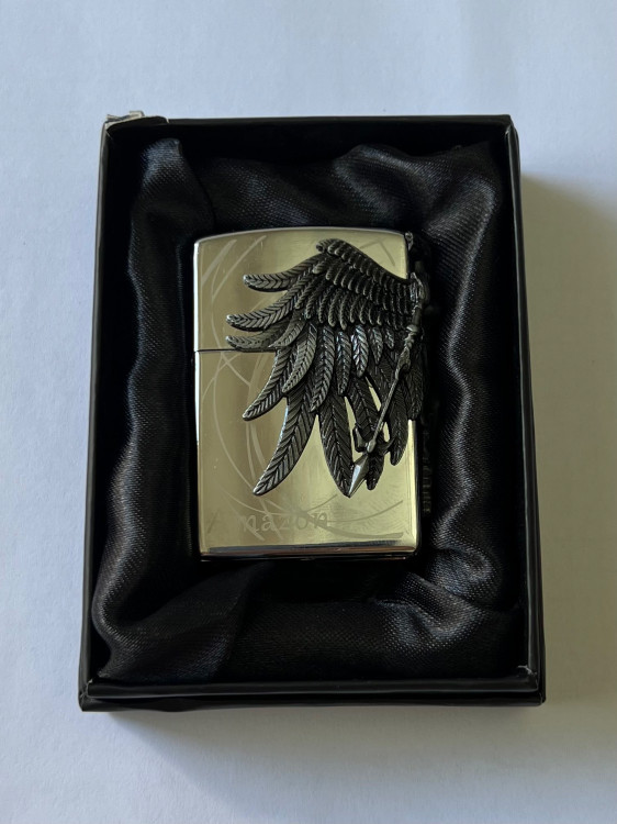 فندک گازی طرح زیپو برند لایتر(Lighter) مدل «Amazon Angel» نقرهای براق با بال فرشته برجسته سیاه قلم